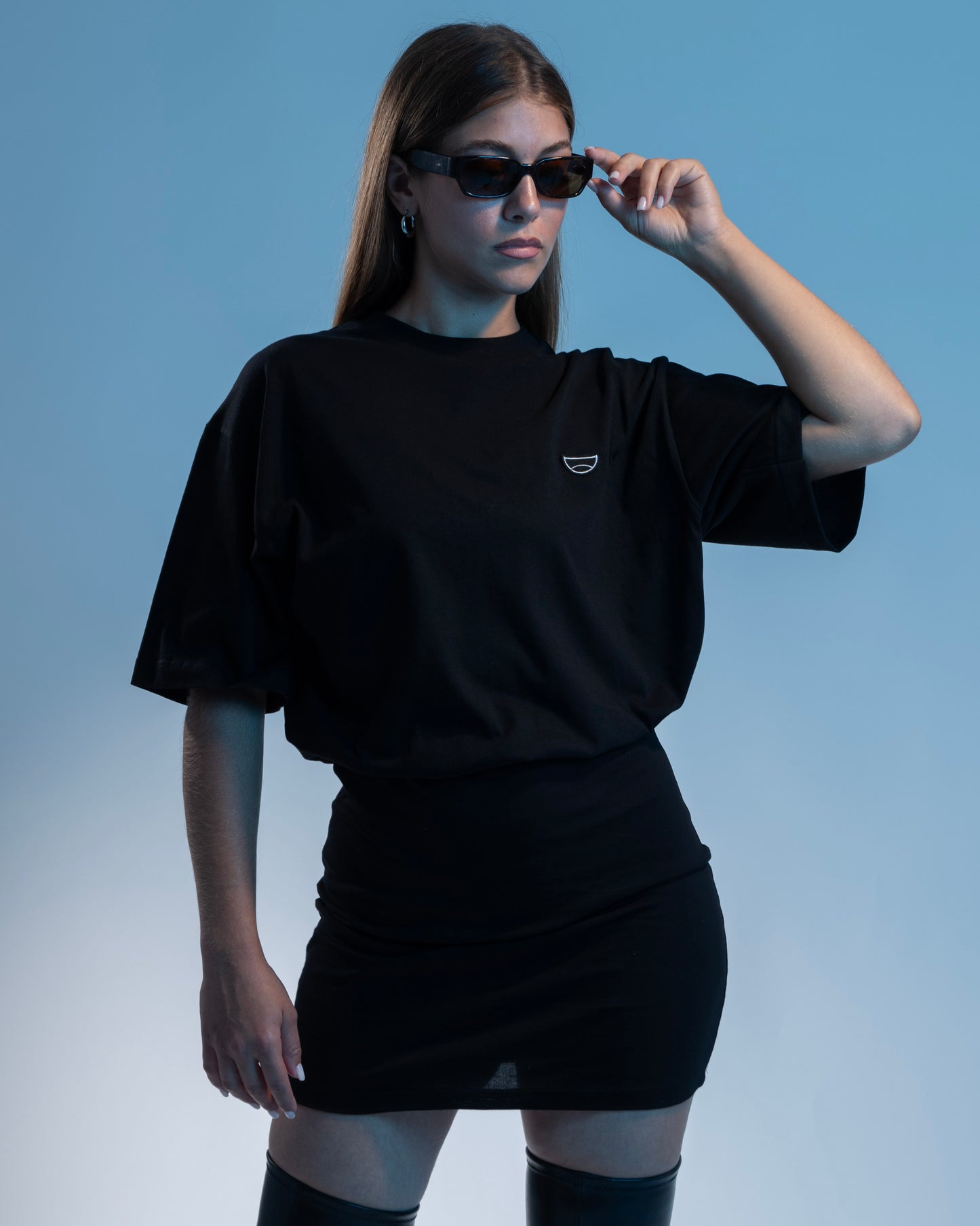 Black mini tee dress with short sleeves and a relaxed fit, perfect for casual wear