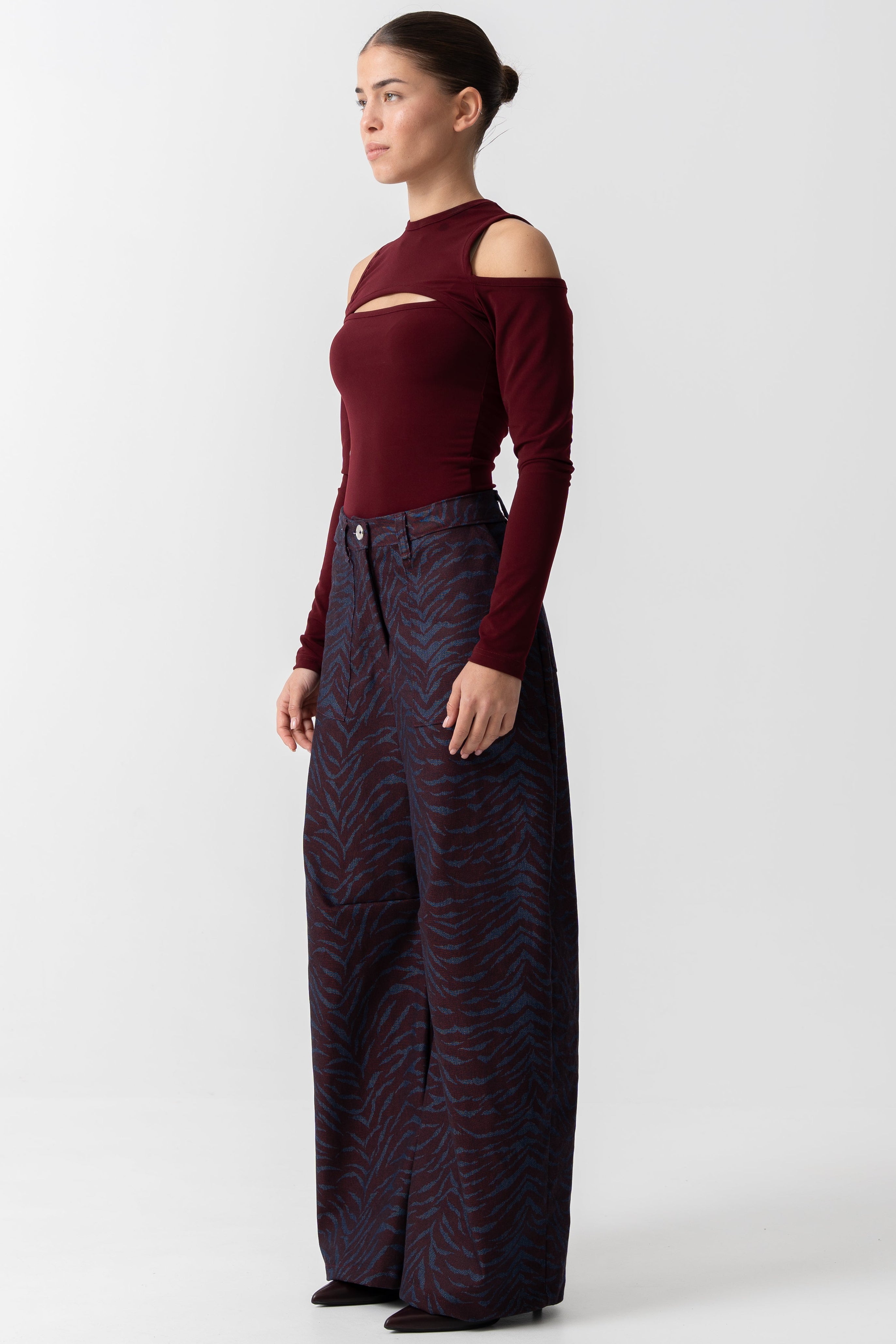 Burgundy zebra denim pants